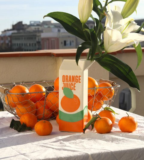 Vase en forme de JUS D'ORANGE de chez FLUID MARKET